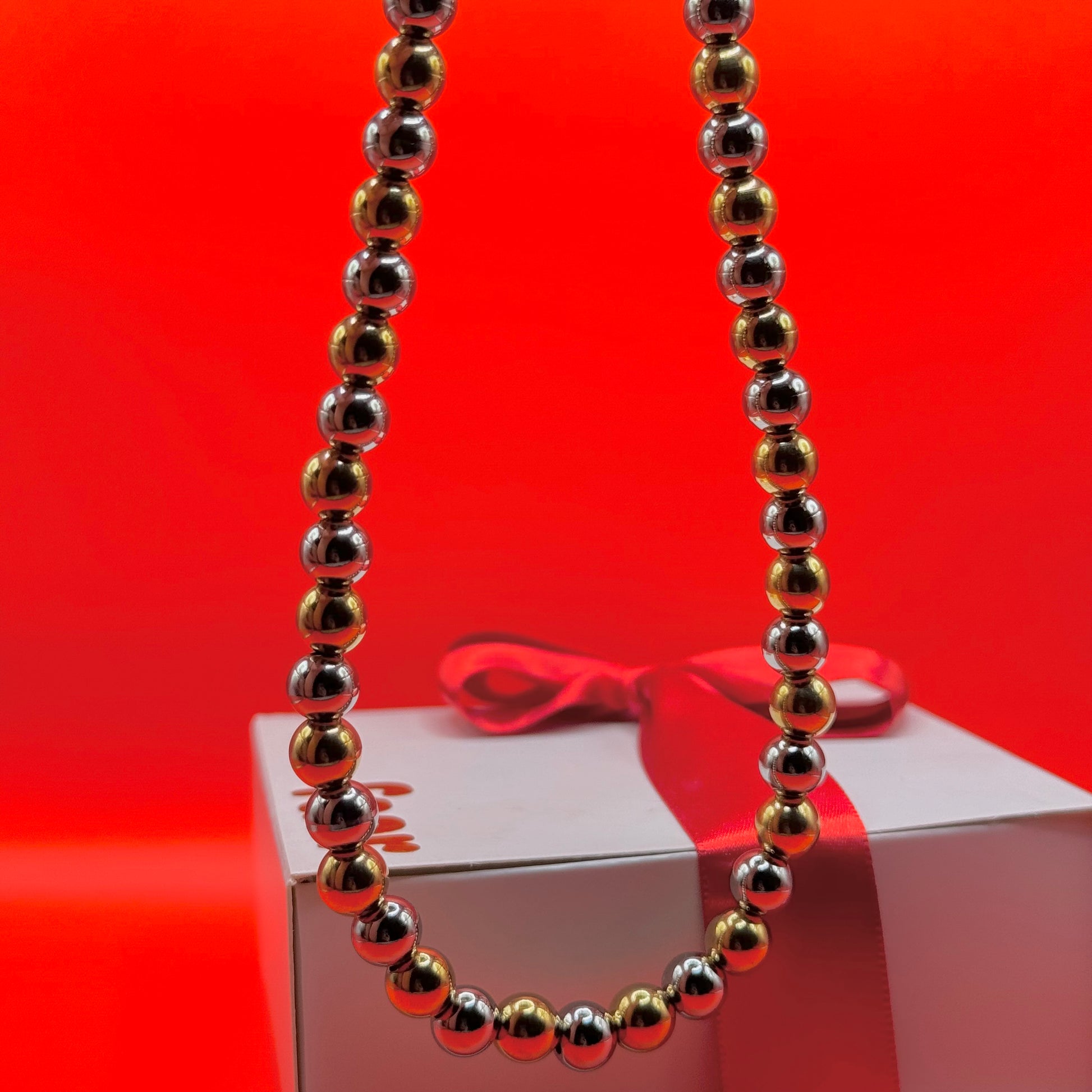 Collar Bolas Plateado y Dorado