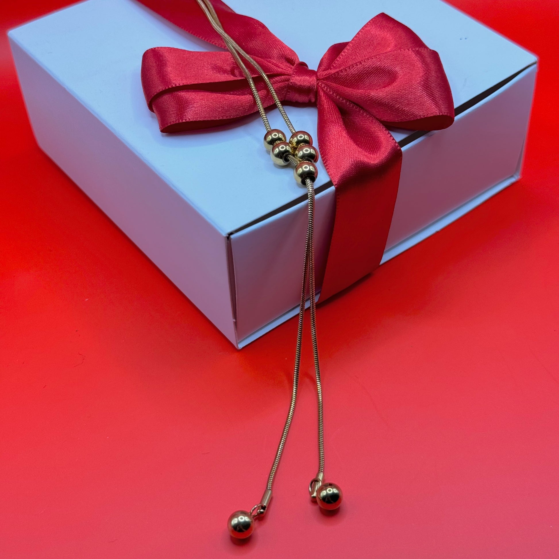 Corbatín Dorado Bolas