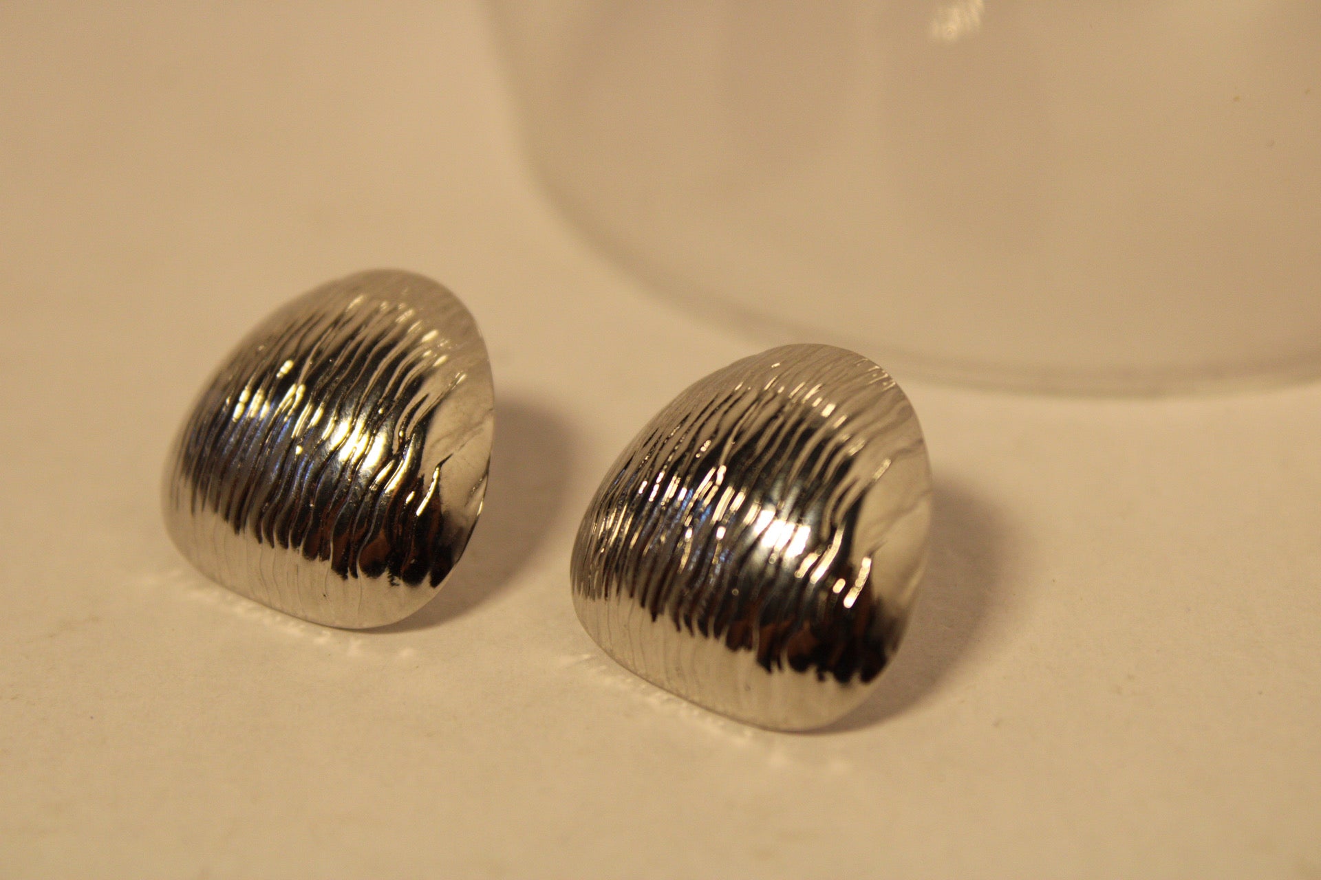 Aretes Canto Plateado